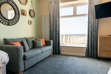 Double sofa bed in Junior suite with sea view